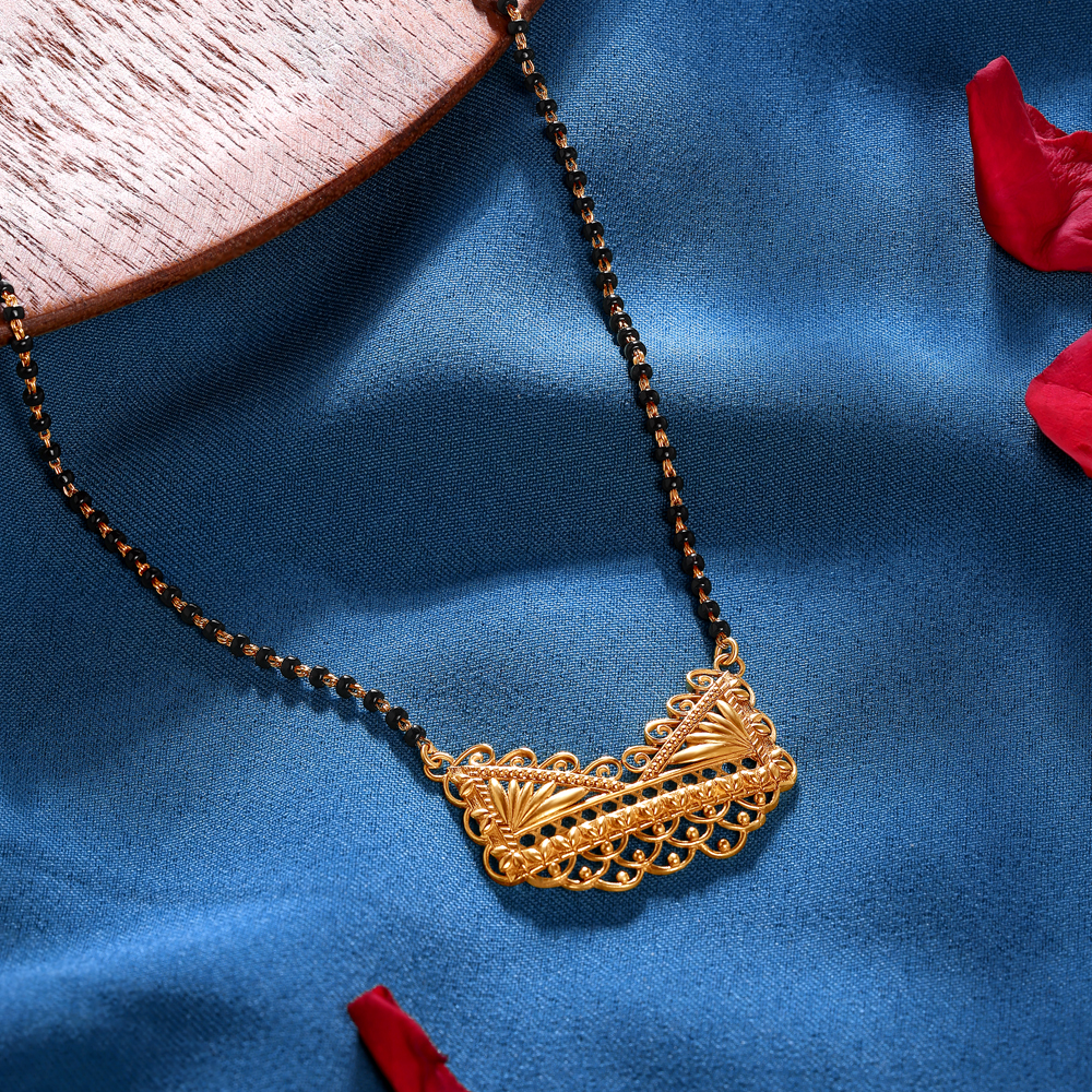 Ornate Beauty Gold Mangalsutra
Ornate Beauty Gold Mangalsutra