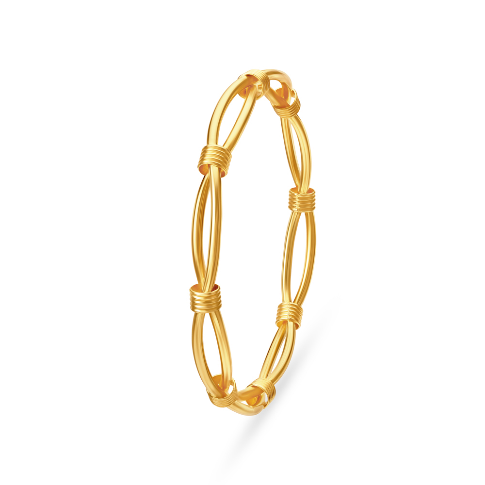 Twisted Brilliance Gold Bangle
Twisted Brilliance Gold Bangle
