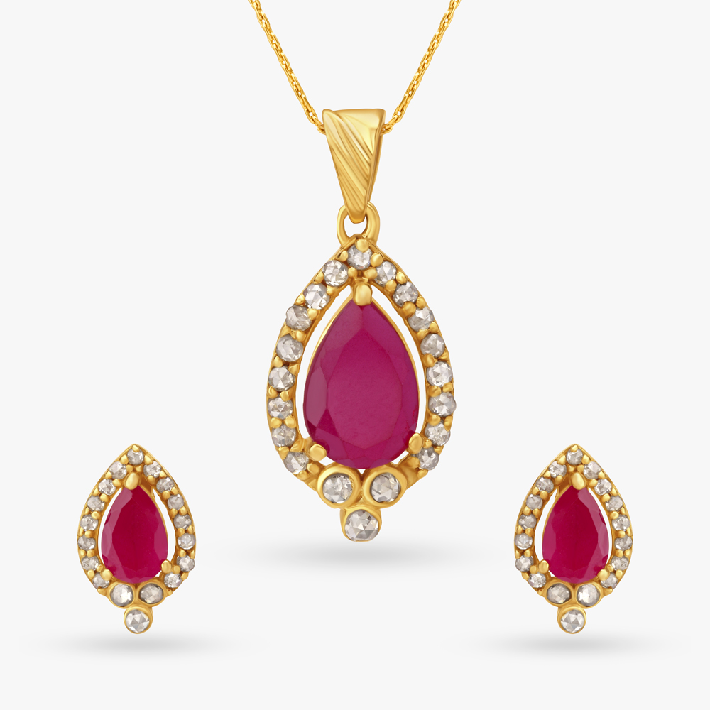 Coloured Stones Studded Gold Pendant and Earrings
Coloured Stones Studded Gold Pendant and Earrings