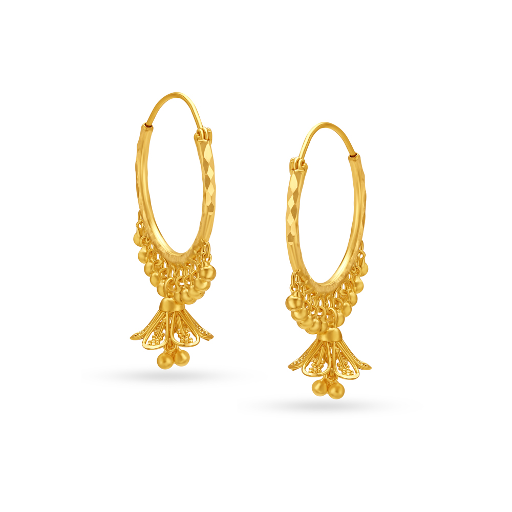 Elaborate Gold Hoops with Jhumka
Elaborate Gold Hoops with Jhumka