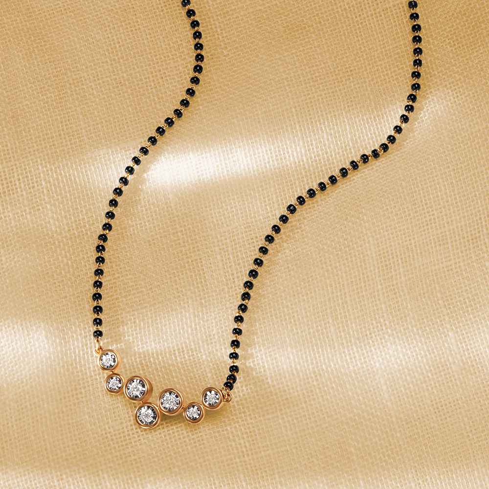 Shimmery Simplicity Diamond Mangalsutra
Shimmery Simplicity Diamond Mangalsutra