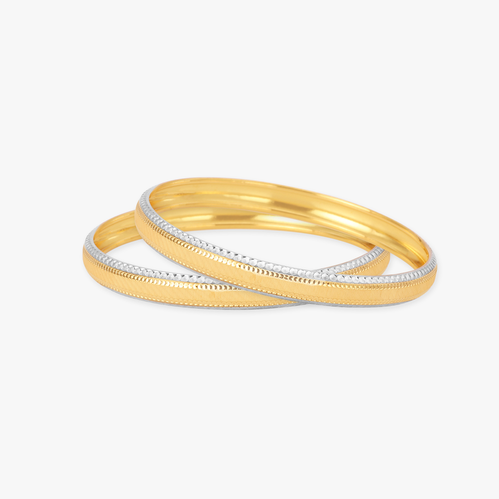 Dual-Tone Gold Bangles
Dual-Tone Gold Bangles