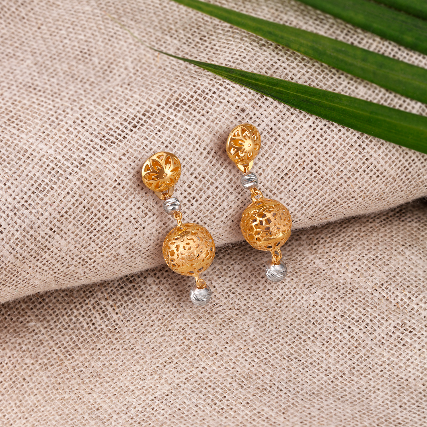 Brilliant Dual Toned Gold Drop Earrings
Brilliant Dual Toned Gold Drop Earrings