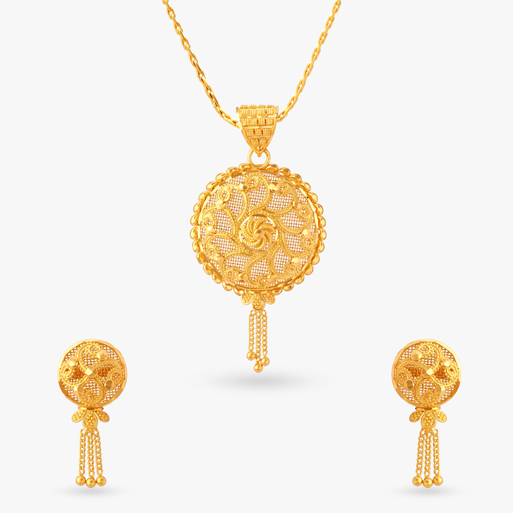 Lustrous Gold Pendant and Earrings Set
Lustrous Gold Pendant and Earrings Set