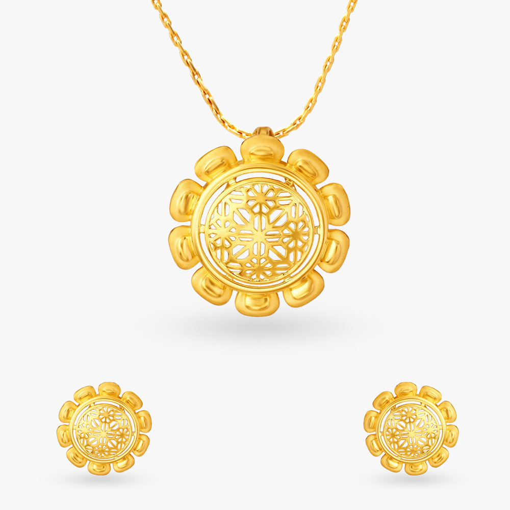 

Ornate Gold Pendant and Earrings Set
