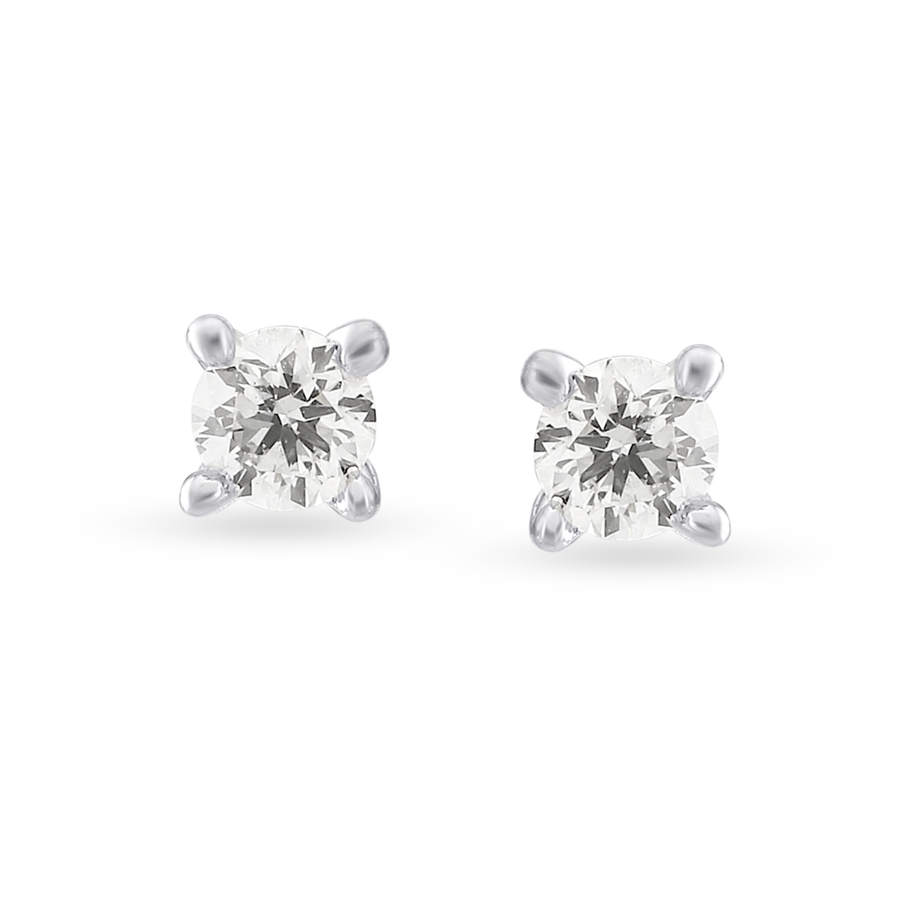 

Traditional Diamond and White Gold Single Stone Stud Earrings