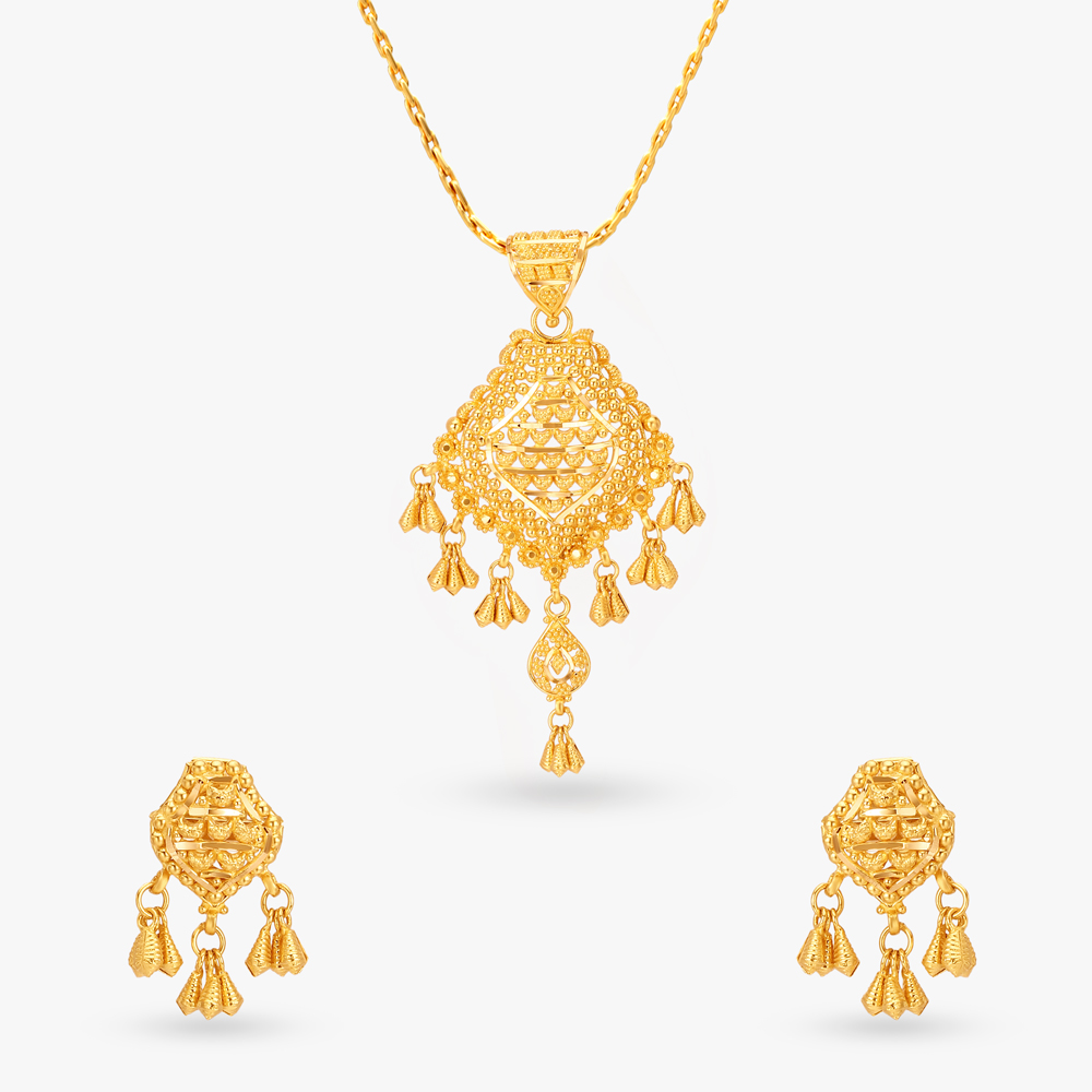 

Extravagant Gold Pendant and Earrings Set