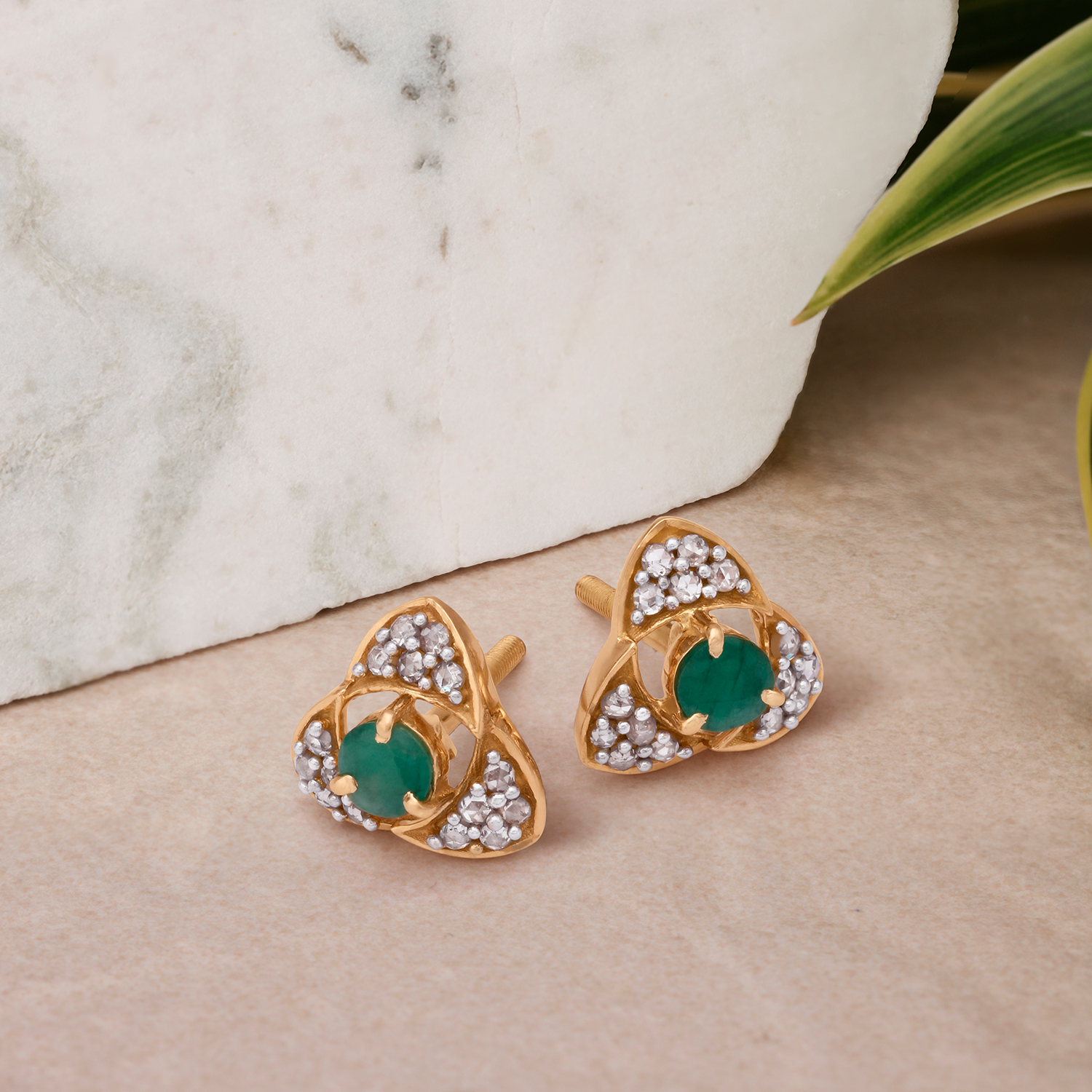 Arresting 18 Karat Yellow Gold And Emerald Triangular Studs