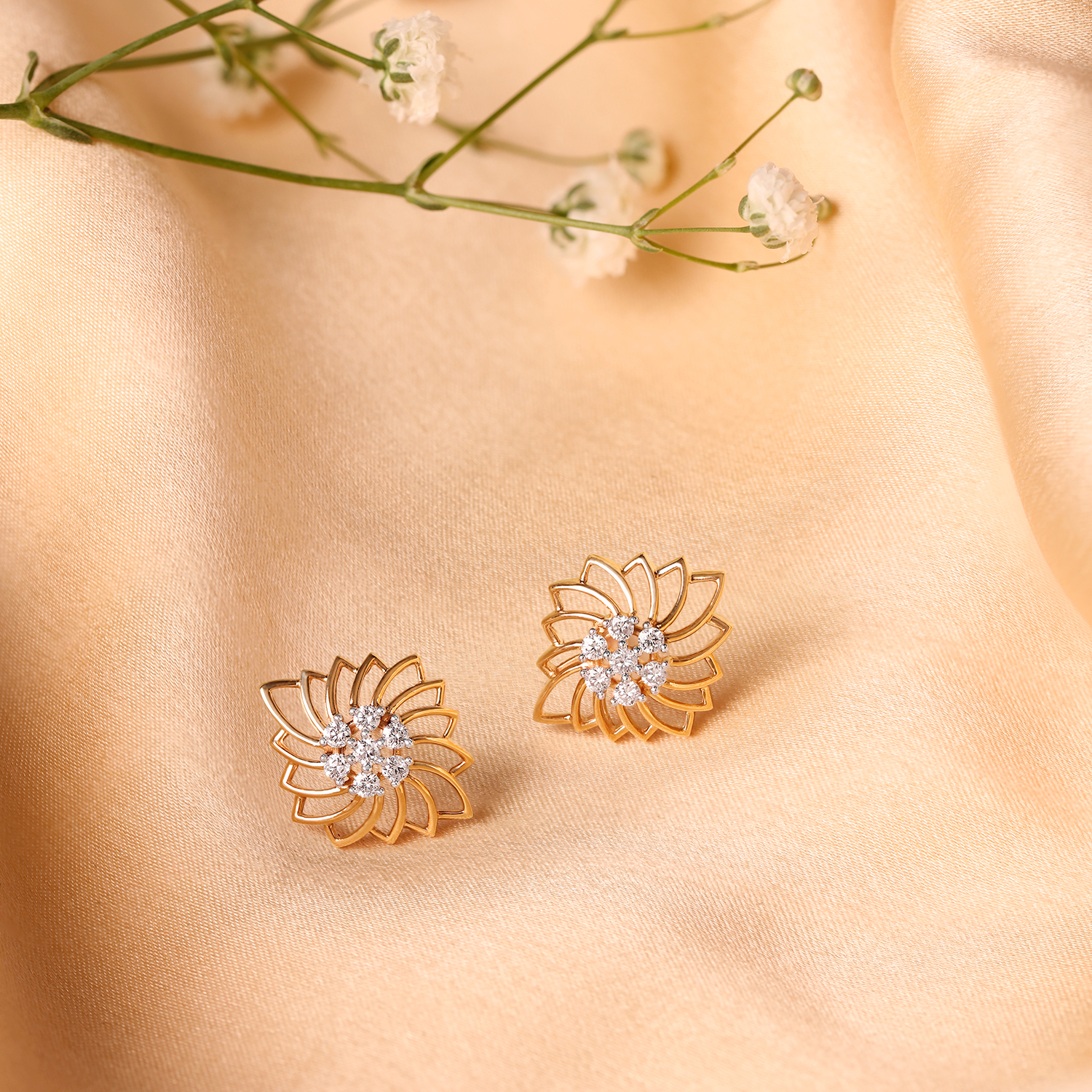 

Charming Jali Work Floral Diamond Stud Earrings