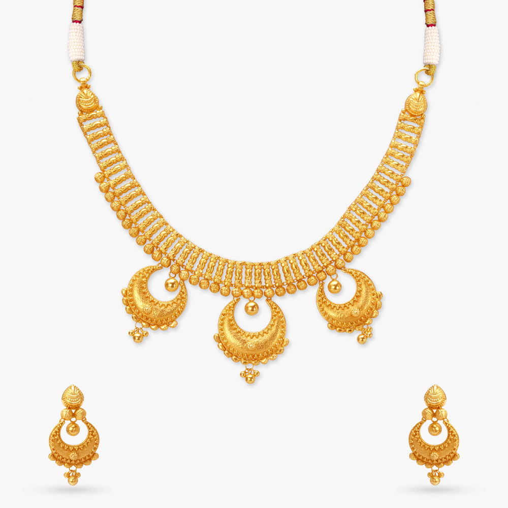 

Ethereal Grandeur Gold Necklace Set