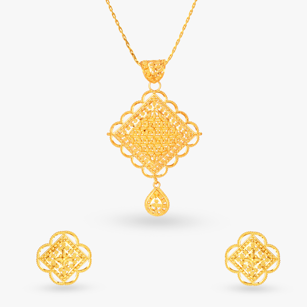 

Intriguing Gold Pendant and Earrings Set