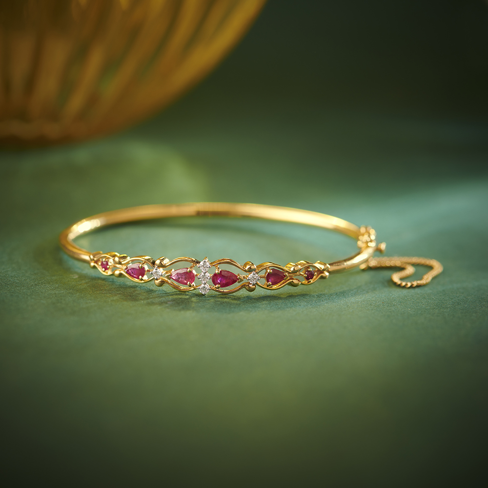 

Fancy Ruby and Diamond Gold Bangle