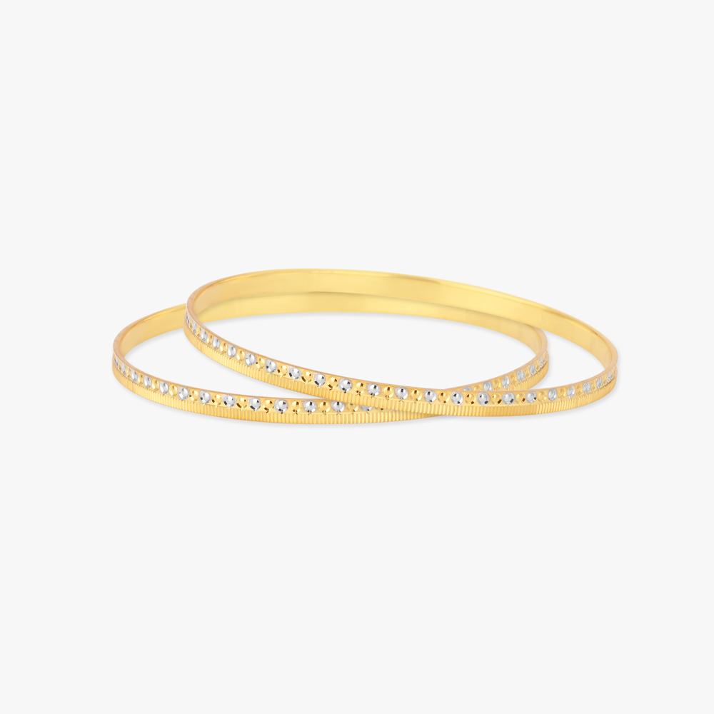 

Geometric Gold Bangles