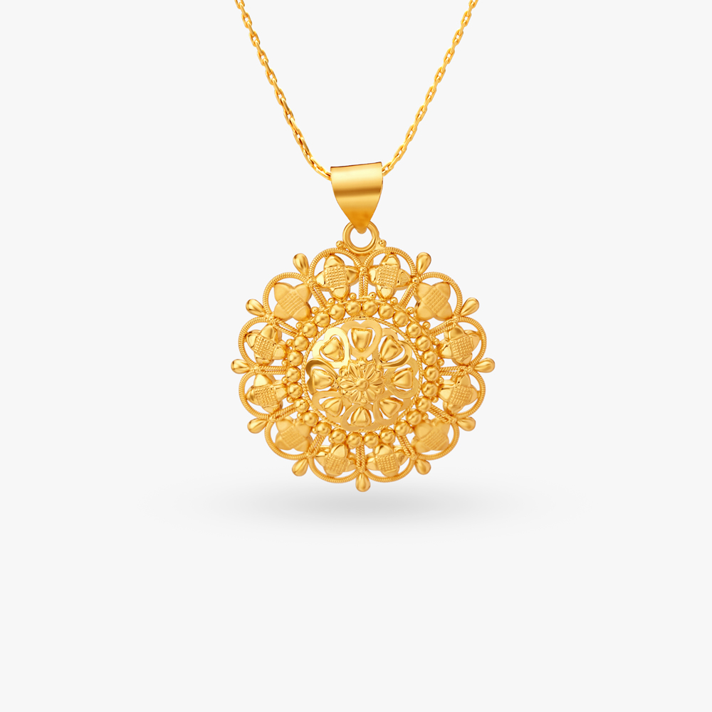 

Regal Gold Pendant and Earrings Set