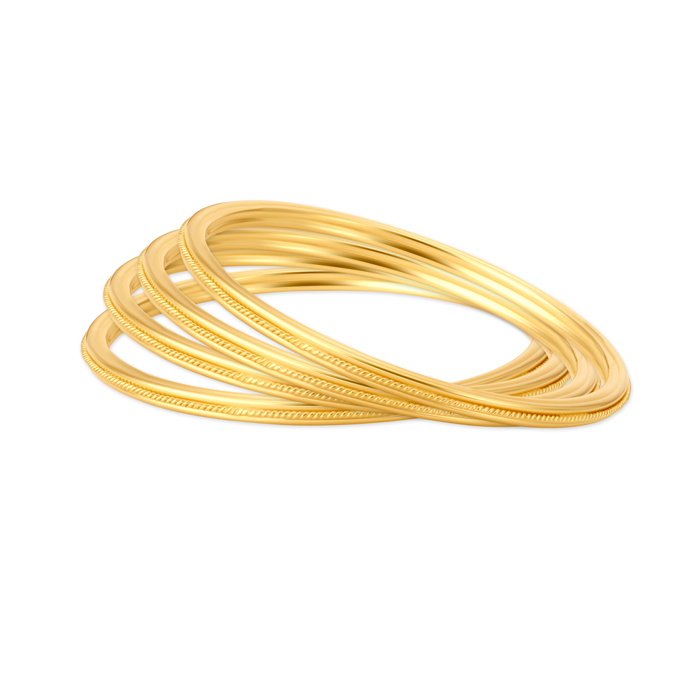 Carved Glossy Gold Bangle