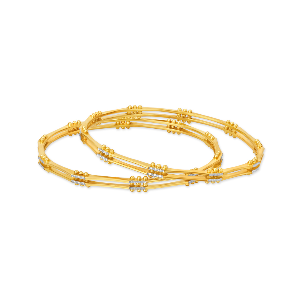 Distinctive Yellow Gold Beaded Ribbed Bangles