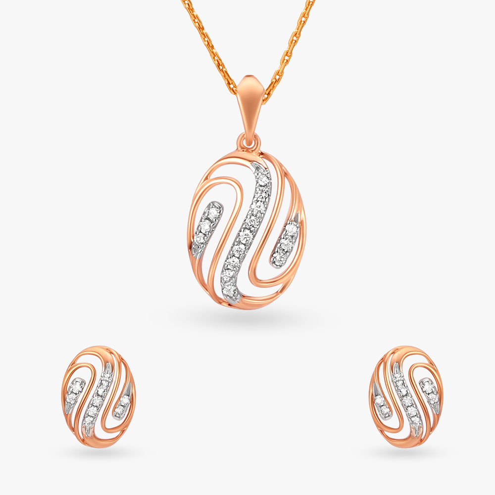 

Sinuous Diamond Pendant and Earrings Set