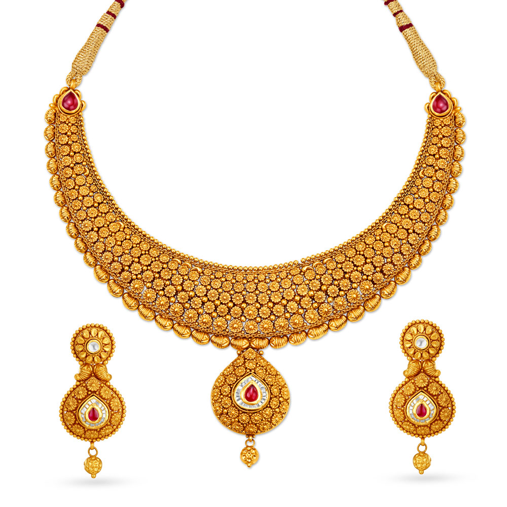 

Shimmering Gold Teardrop Necklace Set