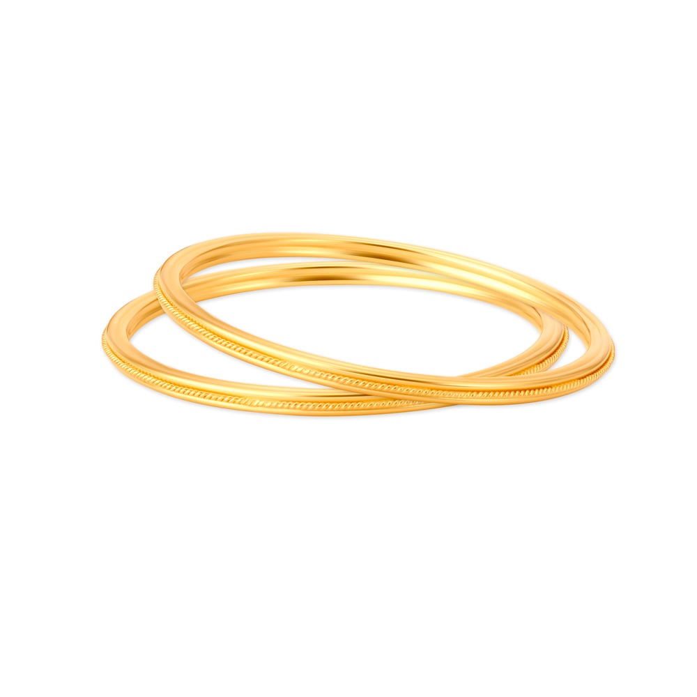 Carved Glossy Gold Bangle