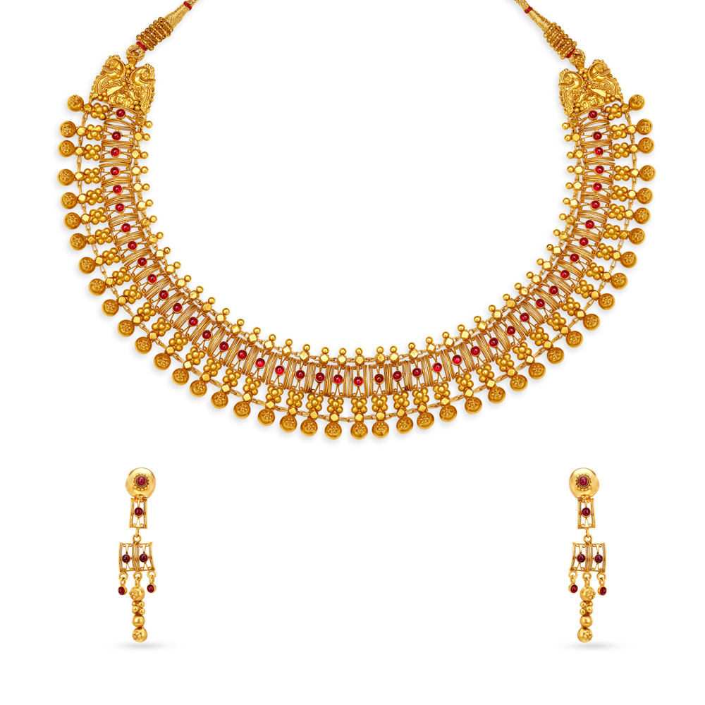 

Elegant Gold Necklace Set