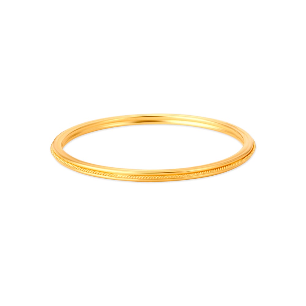 

Carved Glossy Gold Bangle
