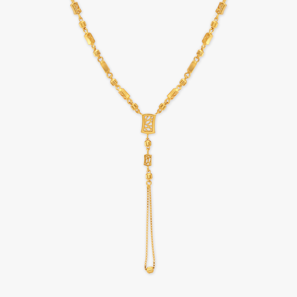 Intricate Gold Pendant with Chain