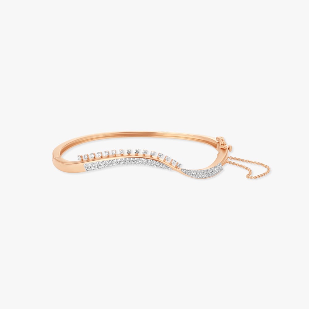 

Intriguing Serpentine Diamond Bangle